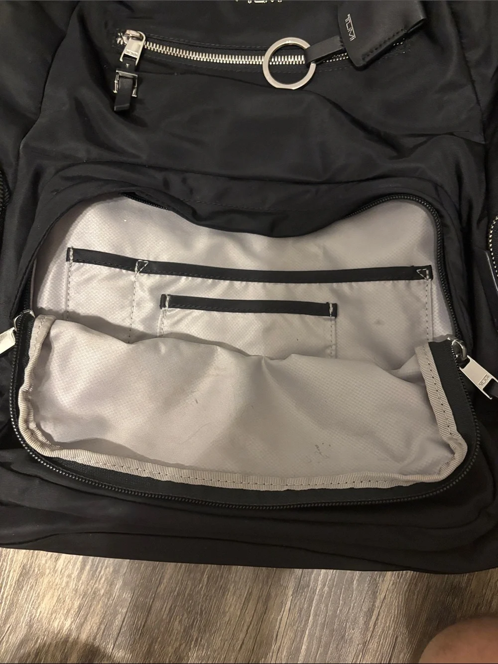 Tumi Black Nylon Backpack with Front Zip Pockets